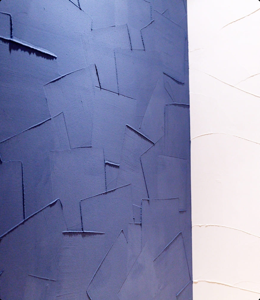 自然素材と回遊同線にこだわったコンパクトな家の漆喰壁